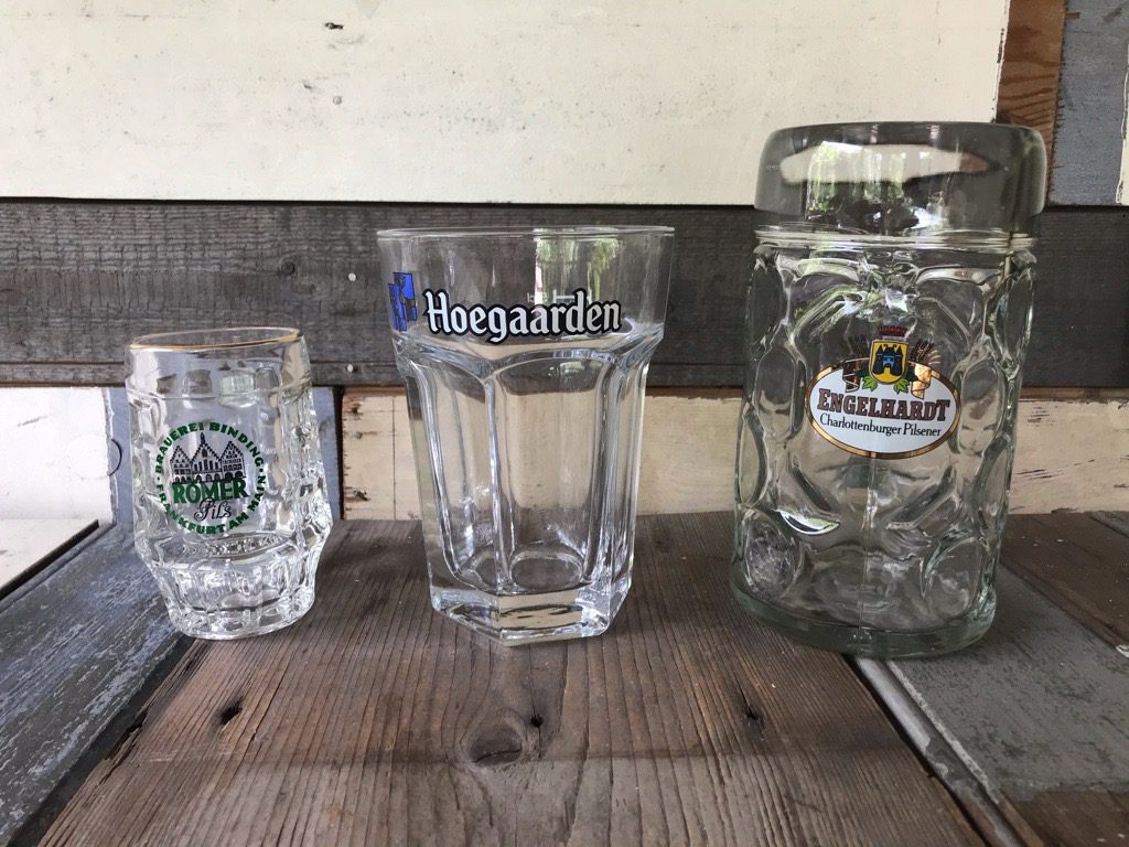 collection of vintage beer mugs from glass