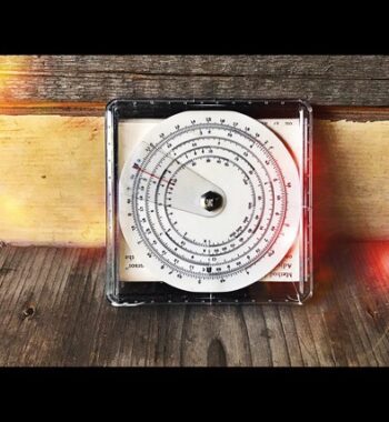 Space Age small circular slide rule box 1970 Hong Kong
