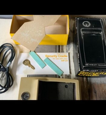 Hewlett Packard security cradle to HP 21 22 25 25C 27 29C Calculator 1970 USA