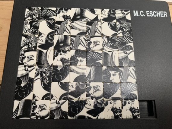 M.C. Escher sliding puzzle game 1990 Pussycat Holland Germany - Eight heads