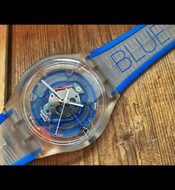 Swatch SUJK 104 Fluid Word BLUE mens quartz watch 2005 Swiss