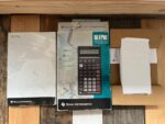 Texas Instruments TI BA II Plus Business calculator complete set 1999 USA